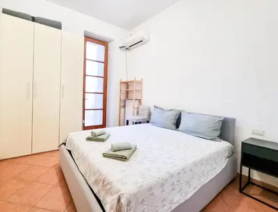 Letto o letti in una camera di Giardino nel cuore di Firenze - piano terra