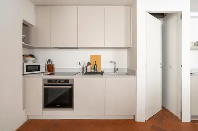 Cucina o angolo cottura di The Tornabuoni Palace By San Firenze Collection