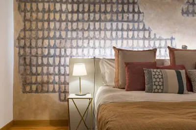 Letto o letti in una camera di The Tornabuoni Palace By San Firenze Collection