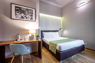 Letto o letti in una camera di Antico Centro Suite