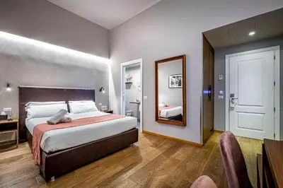 Letto o letti in una camera di Antico Centro Suite