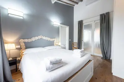 Letto o letti in una camera di Central Nest by MMega
