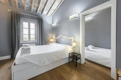 Letto o letti in una camera di Central Nest by MMega