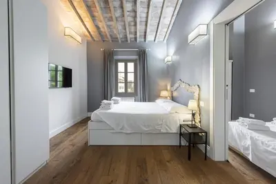 Letto o letti in una camera di Central Nest by MMega