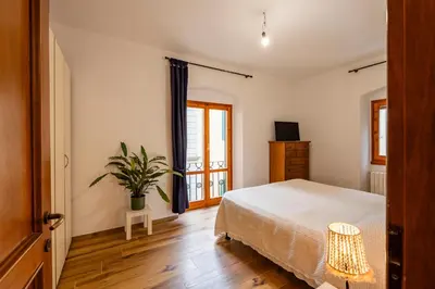 Letto o letti in una camera di Elena's Apt with Lodge, near the Center