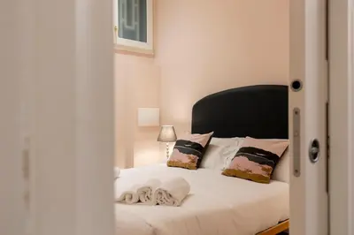 Letto o letti in una camera di Fiesolana Sweet House