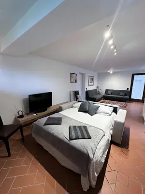 Letto o letti in una camera di la taverna di Caterina