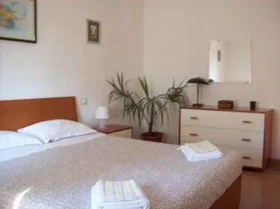Letto o letti in una camera di Casa Mia
