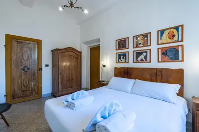 Letto o letti in una camera di Sant'Antonino Cozy Corner