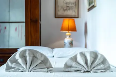 Letto o letti in una camera di Sant'Antonino Cozy Corner