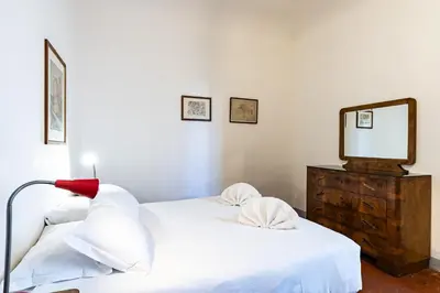 Letto o letti in una camera di Sant'Antonino Cozy Corner