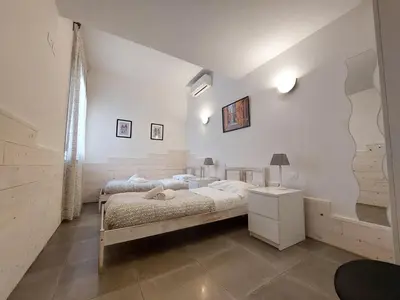 Letto o letti in una camera di Casa Vacanze Francesco