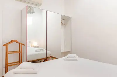 Letto o letti in una camera di Calzaiuoli Sunshine