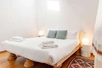 Letto o letti in una camera di Calzaiuoli Sunshine