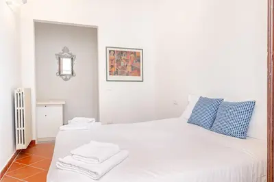 Letto o letti in una camera di Calzaiuoli Sunshine