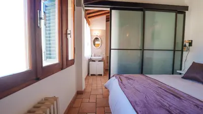 Letto o letti in una camera di Santa Croce Historic Loft with a View