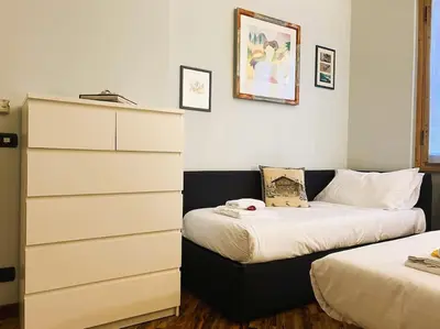 Letto o letti in una camera di Verrazzano House Florence