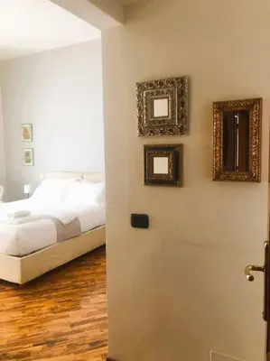Letto o letti in una camera di Verrazzano House Florence