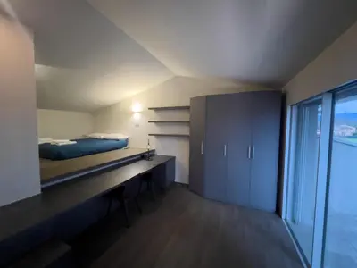 Letto o letti in una camera di Villa Aria - Firenze Settignano