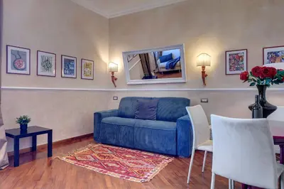 Area soggiorno di Novella Apartment by Mamo Florence