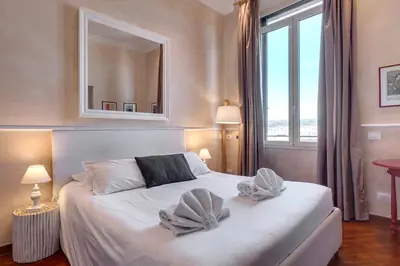 Letto o letti in una camera di Novella Apartment by Mamo Florence