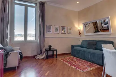 Area soggiorno di Novella Apartment by Mamo Florence