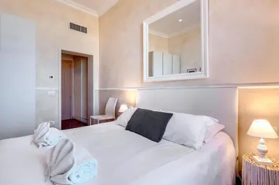 Letto o letti in una camera di Novella Apartment by Mamo Florence