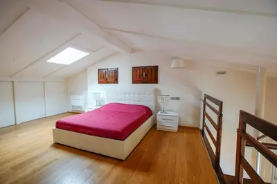 Letto o letti in una camera di Ampio bilocale centralissimo, Firenze