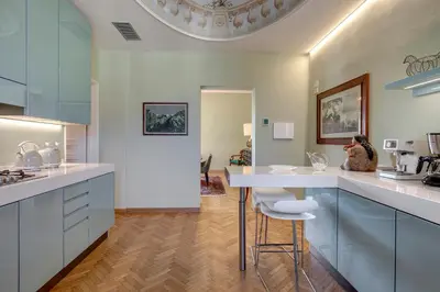 Cucina o angolo cottura di Vespucci Luxury Apartment with Amazing View by Mamo Florence