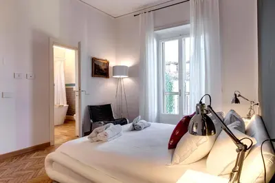 Letto o letti in una camera di Vespucci Luxury Apartment with Amazing View by Mamo Florence
