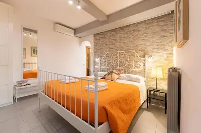 Letto o letti in una camera di Keys of Italy - Macci 41 - Sant' Ambrogio one bedroom flat
