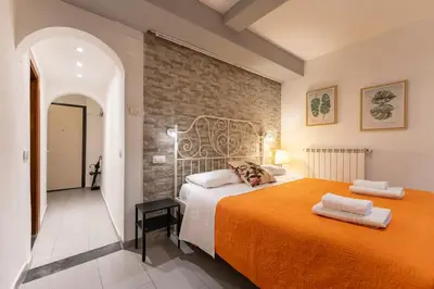 Letto o letti in una camera di Keys of Italy - Macci 41 - Sant' Ambrogio one bedroom flat