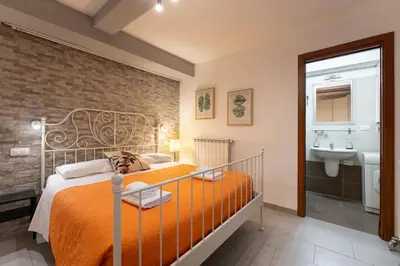 Letto o letti in una camera di Keys of Italy - Macci 41 - Sant' Ambrogio one bedroom flat