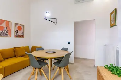 Area soggiorno di GuestHost - San Lorenzo Central Roomy Apartment