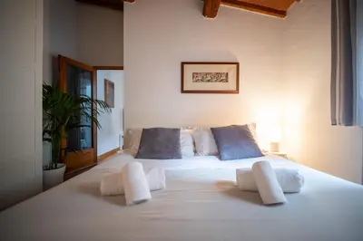 Letto o letti in una camera di San Niccolo Luxury House