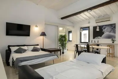 Letto o letti in una camera di Duomo - Grazioso appartamento nel cuore di Firenze