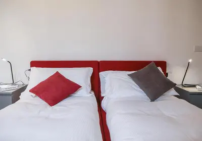 Letto o letti in una camera di Apartments Florence Pepi attic
