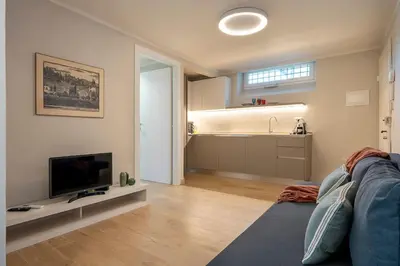 Letto o letti in una camera di Alfieri Apartment