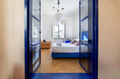 Letto o letti in una camera di San Frediano Suite