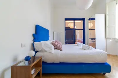 Letto o letti in una camera di San Frediano Suite