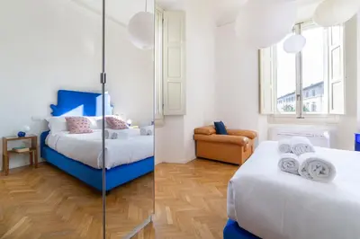 Letto o letti in una camera di San Frediano Suite