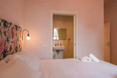 Letto o letti in una camera di B&B Magnolia