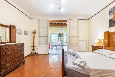 Letto o letti in una camera di San Lorenzo Apartment By San Firenze Collection