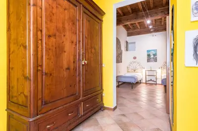 Letto o letti in una camera di San Lorenzo Apartment By San Firenze Collection