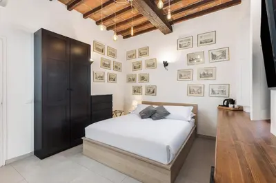 Letto o letti in una camera di Roped Rooms Florence