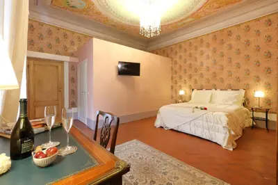 Letto o letti in una camera di Dimora Bandinelli