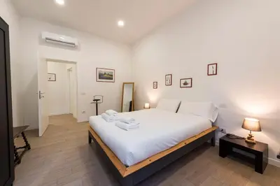 Letto o letti in una camera di New San Marco Apartment