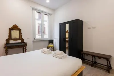 Letto o letti in una camera di New San Marco Apartment