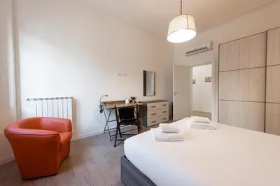 Letto o letti in una camera di La Casa di Leo