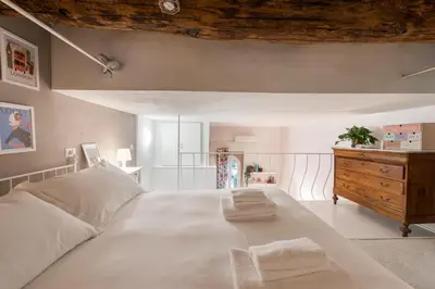 Letto o letti in una camera di San Niccolò59 Your Next Home